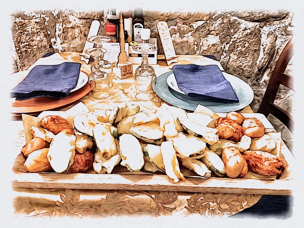 Tagliere di fritti e sfizi della cucina viterbese servito a tavola