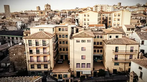 Aerial view of Nazareth Residence among the terracotta roofs and medieval towers of central Viterbo